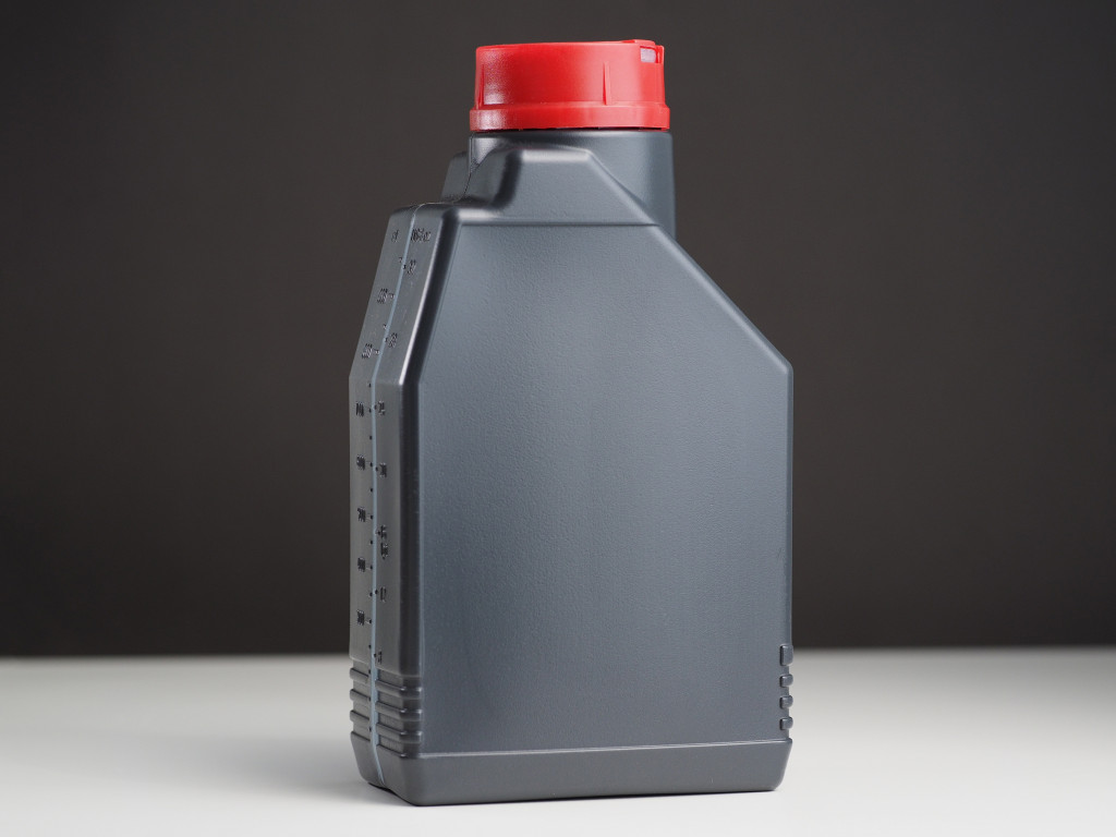 A gray canister of engine oil